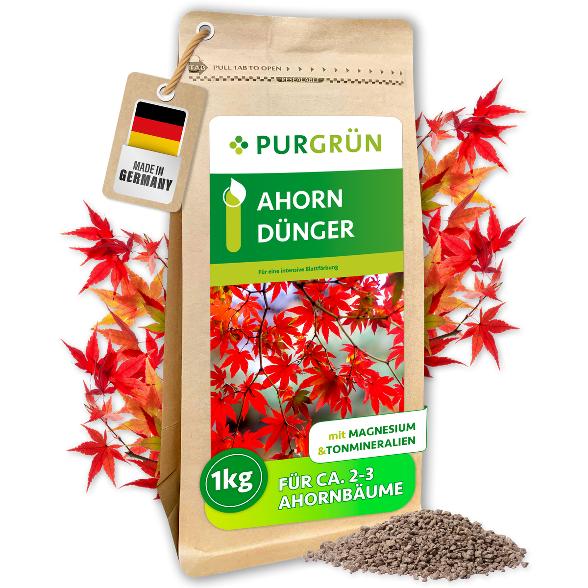 Purgrün Ahorn-Dünger im 1-kg-Beutel mit Magnesium und Tonmineralien, umgeben von roten Ahornblättern und Granulat.