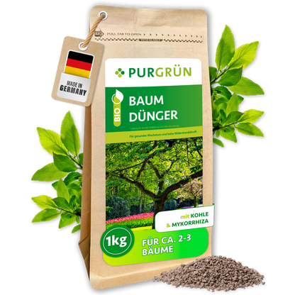 Purgrün Bio-Baumdünger im wiederverschließbaren 1-kg-Beutel, mit Pflanzenkohle und Mykorrhiza; Granulat liegt davor.