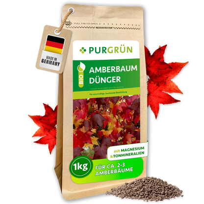 Purgrün Bio-Amberbaum-Dünger im 1-kg-Beutel für ca. 2–3 Amberbäume, mit roten Blättern und feinem Granulat.