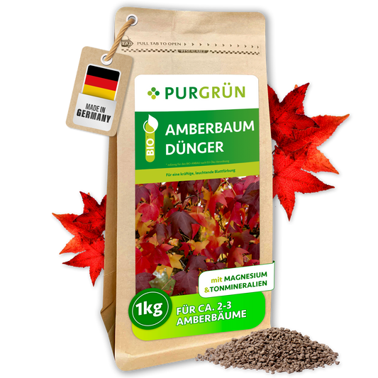 Purgrün Bio-Amberbaum-Dünger im 1-kg-Beutel für ca. 2–3 Amberbäume, mit roten Blättern und feinem Granulat.