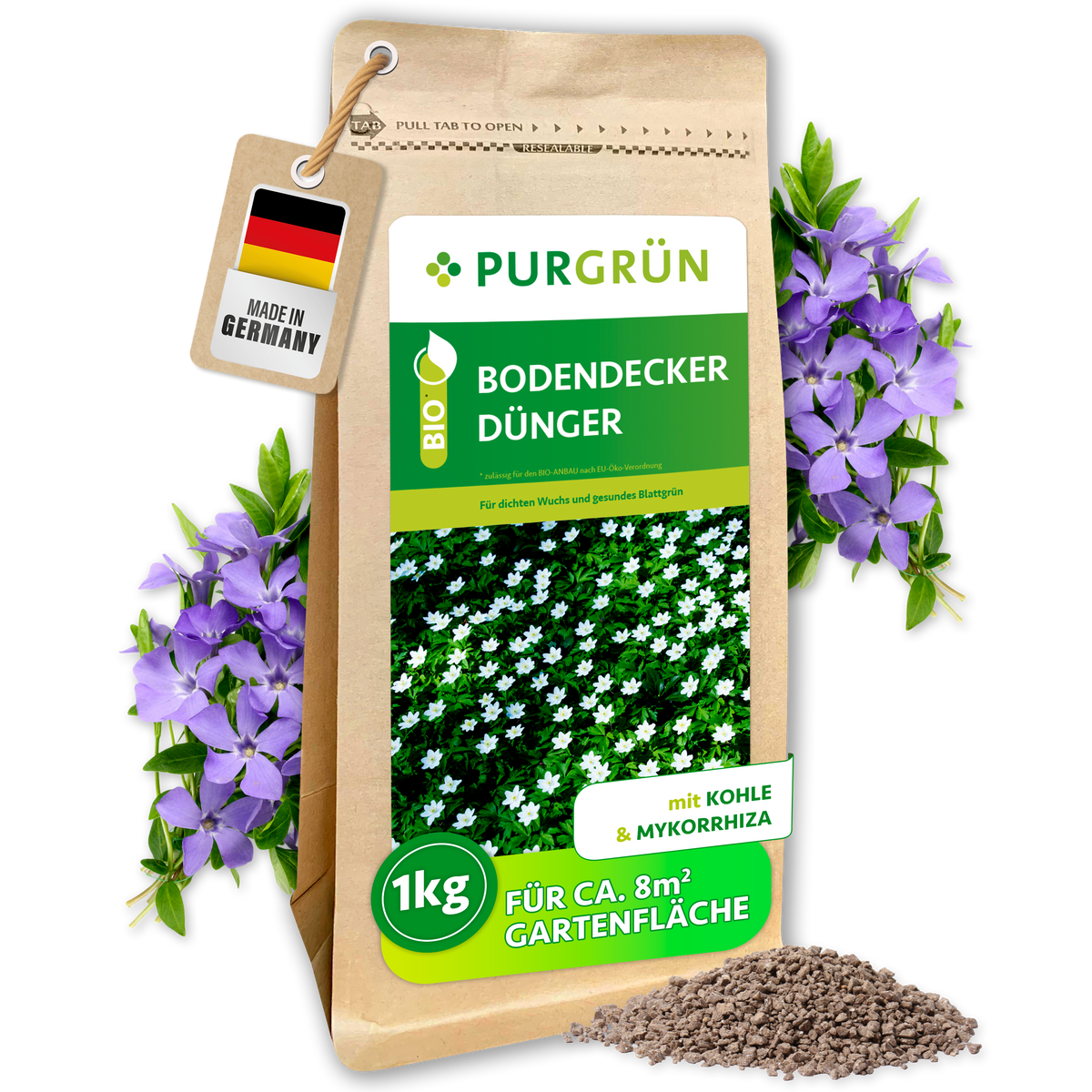 Bio-Bodendecker-Dünger im 1-kg-Beutel mit Pflanzenkohle und Mykorrhiza, ausreichend für ca. 8 m² Gartenfläche.