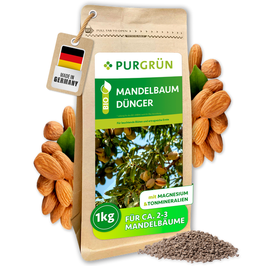 Purgrün Bio-Mandelbaum-Dünger im 1-kg-Beutel mit Mandeln und feinem Granulat; laut Etikett für ca. 2–3 Mandelbäume.