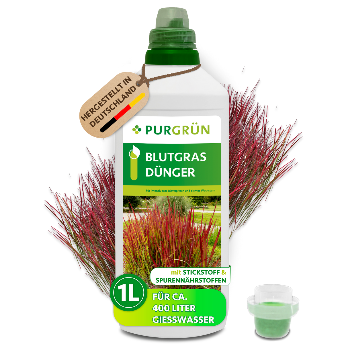 Purgrün Blutgras-Dünger im 1-Liter-Kanister mit Dosierkappe vor rotem Blutgras; laut Etikett für ca. 400 Liter Gießwasser.