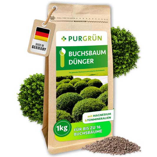 Purgrün Buchsbaumdünger im 1-kg-Standbeutel mit feinem Granulat und Buchsbaumkugeln; laut Verpackung für bis zu 16 Buchsbäume.
