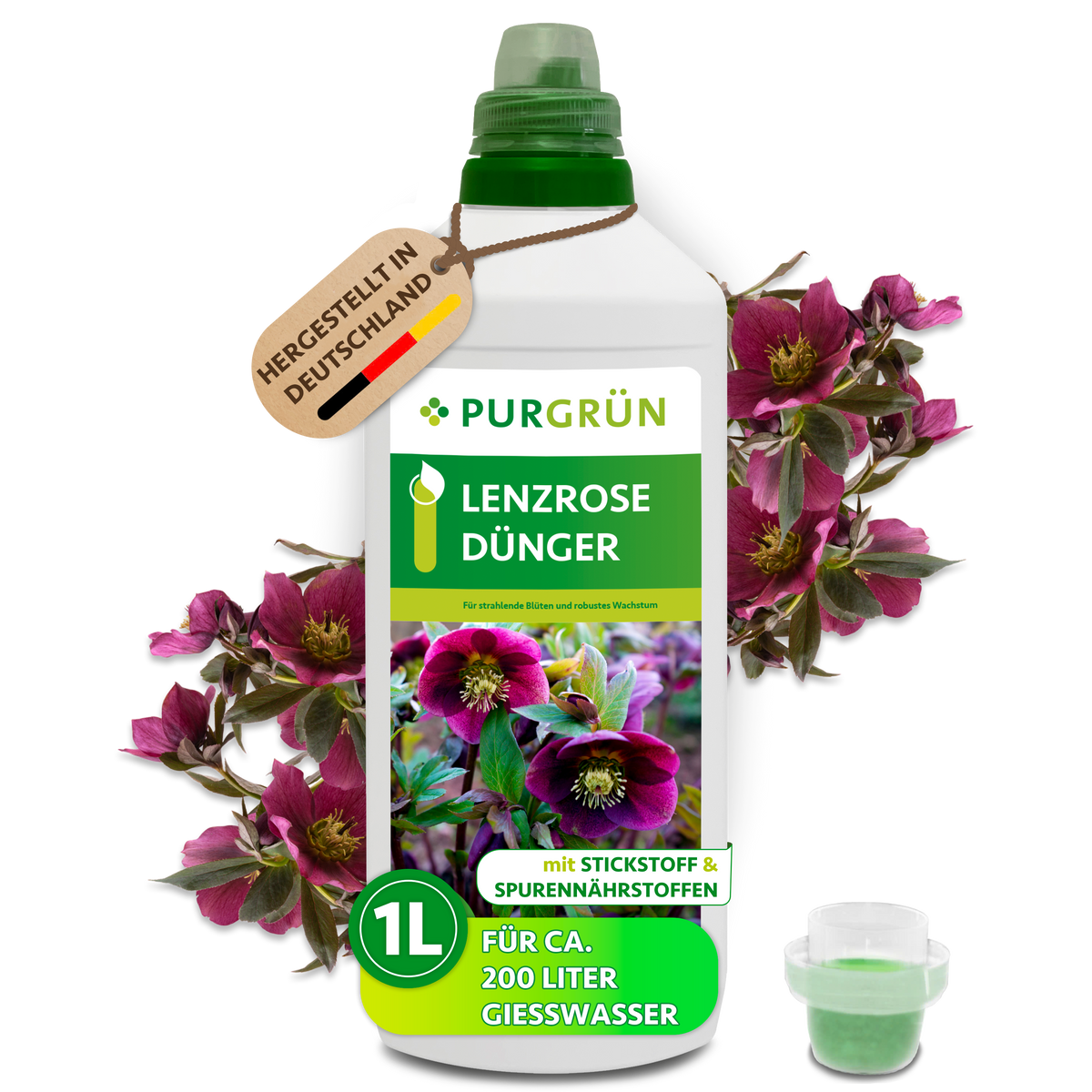 Purgrün Lenzrose-Dünger in der 1-Liter-Flasche mit Dosierkappe, umrahmt von dunkelroten Lenzrosen; ausreichend für ca. 200 Liter Gießwasser.