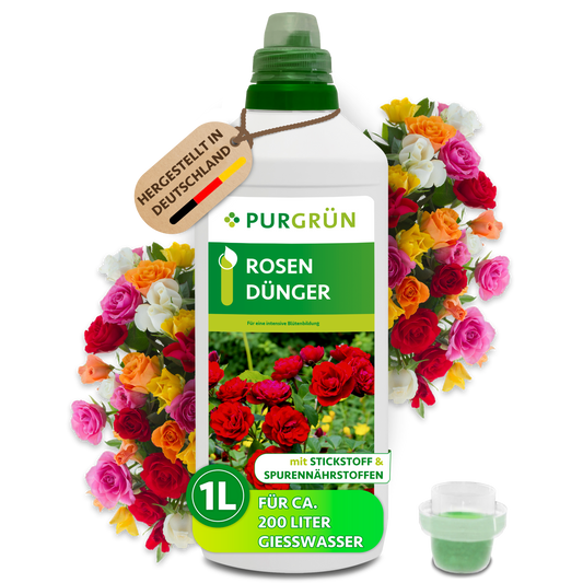 Purgrün Rosendünger in der 1-Liter-Flasche mit Dosierkappe, umgeben von bunten Rosen; laut Etikett für ca. 200 Liter Gießwasser.