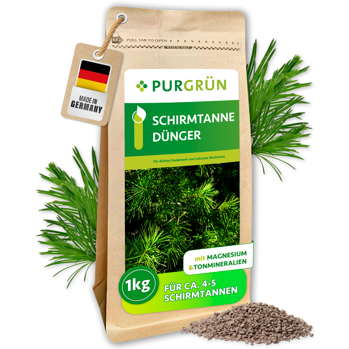 Purgrün Schirmtanne-Dünger im 1-kg-Beutel mit Magnesium und Tonmineralien, umgeben von Nadelzweigen und Granulat.