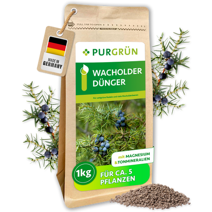 Purgrün Wacholder-Dünger im 1-kg-Beutel mit Wacholderzweigen und feinem Granulat; ausreichend für ca. 5 Pflanzen.