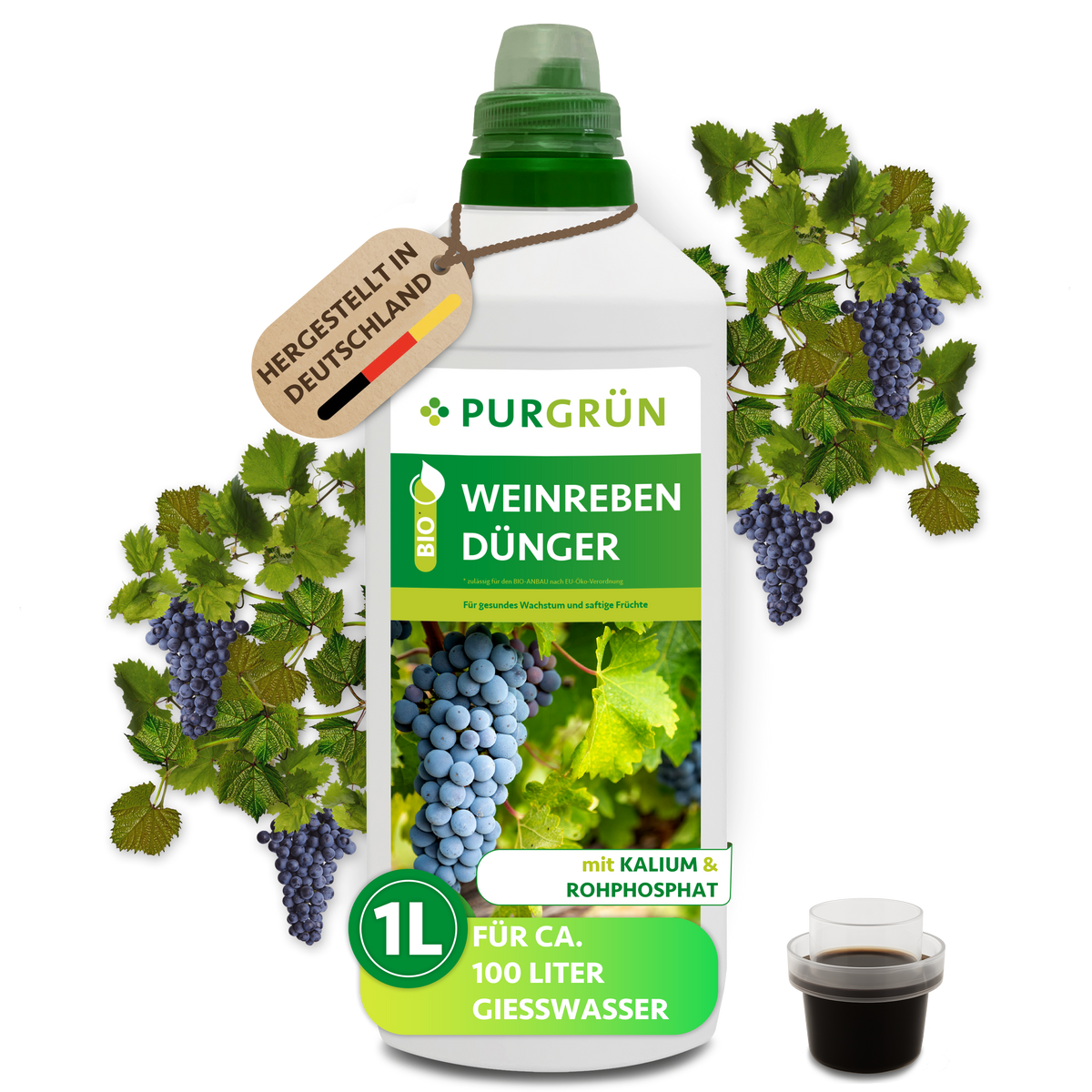 Eine 1-Liter-Flasche Purgrün Bio-Weinreben-Dünger ist abgebildet, dahinter Trauben und Weinreben. Das Etikett weist NPK 3+2+6 aus, ist in Deutschland hergestellt, organisch-mineralisch und für ca. 100 Liter Wasser geeignet.