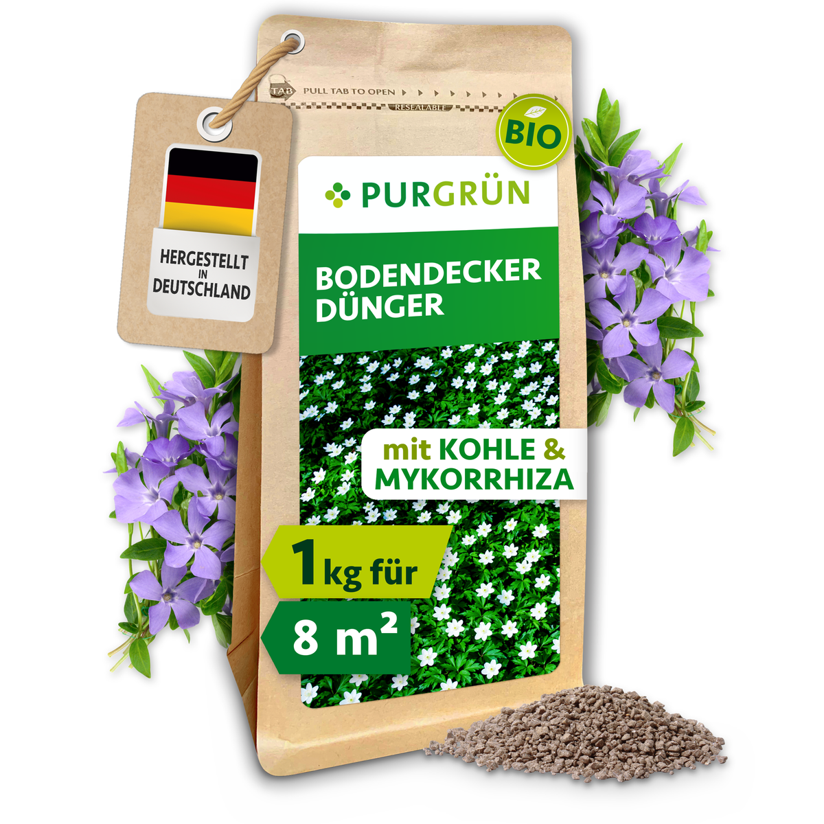 Bio-Bodendecker-Dünger im 1-kg-Beutel mit Pflanzenkohle und Mykorrhiza, ausreichend für ca. 8 m² Gartenfläche.
