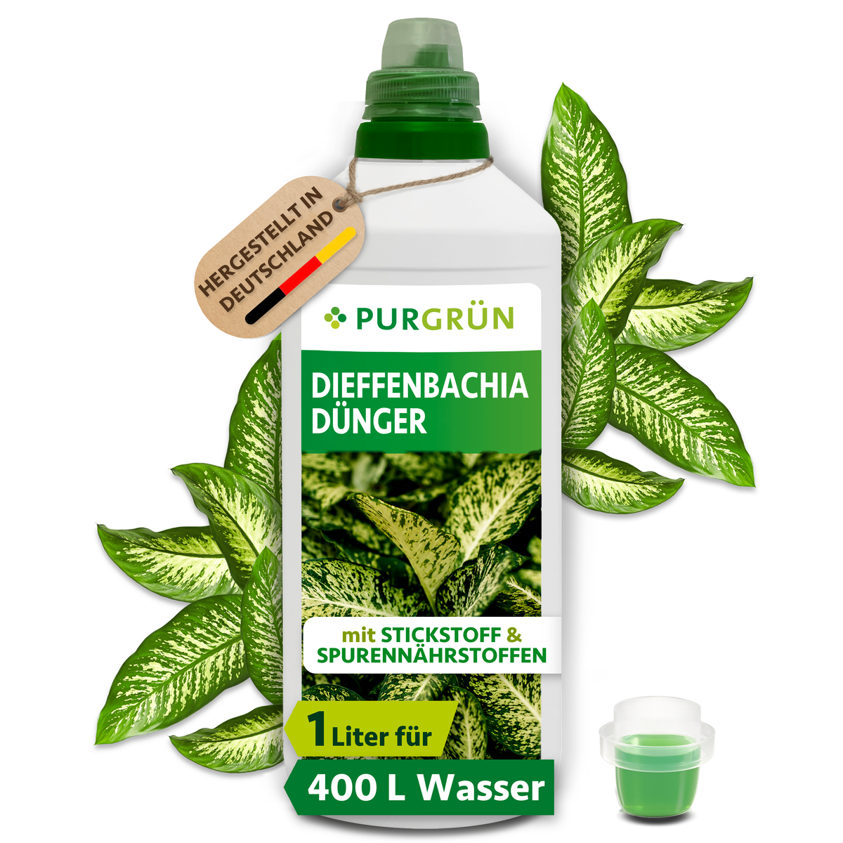 Purgrün Dieffenbachia-Dünger in der 1-Liter-Flasche mit Dosierkappe, umgeben von gemusterten Dieffenbachia-Blättern.