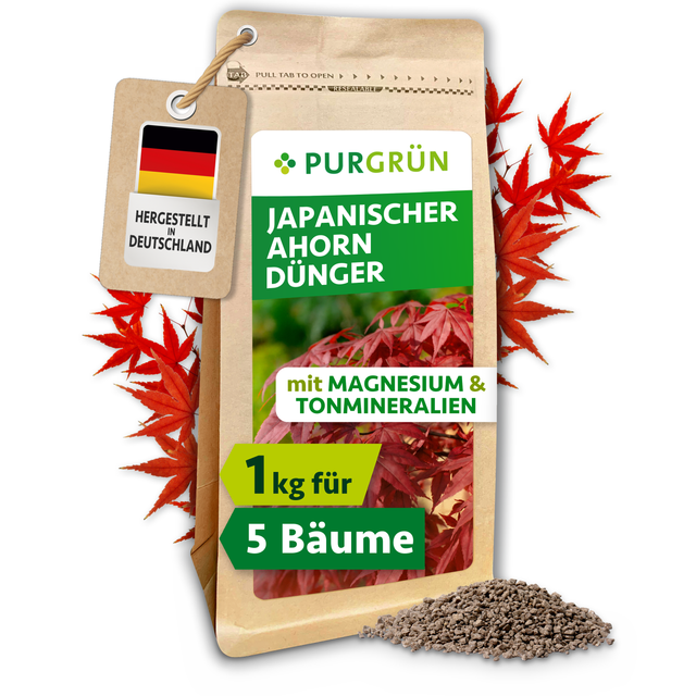 Purgrün Japanischer-Ahorn-Dünger im 1-kg-Beutel, umrahmt von roten Ahornblättern, mit Granulathaufen und „Made in Germany“-Anhänger.
