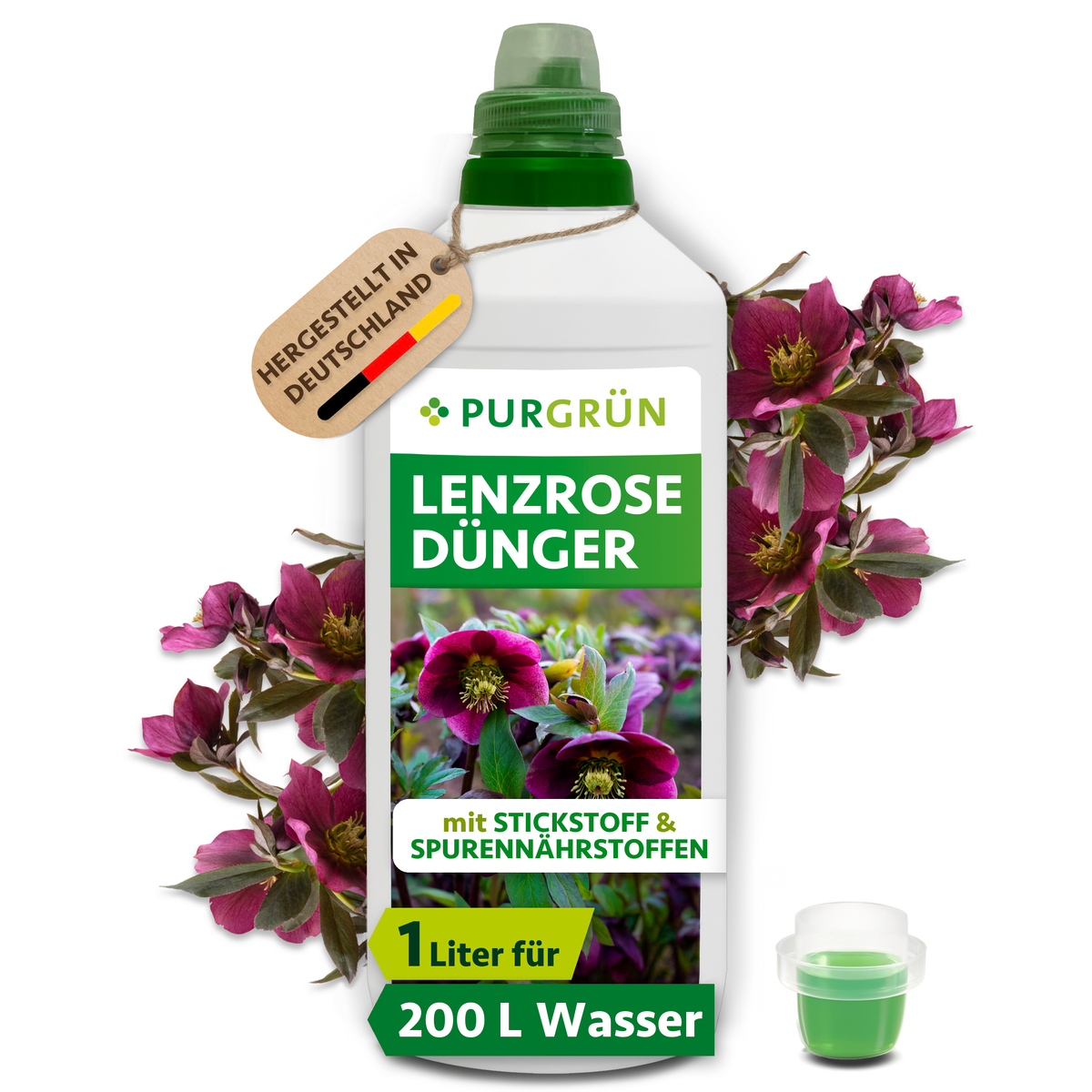 Purgrün Lenzrose-Dünger in der 1-Liter-Flasche mit Dosierkappe, umrahmt von dunkelroten Lenzrosen; ausreichend für ca. 200 Liter Gießwasser.