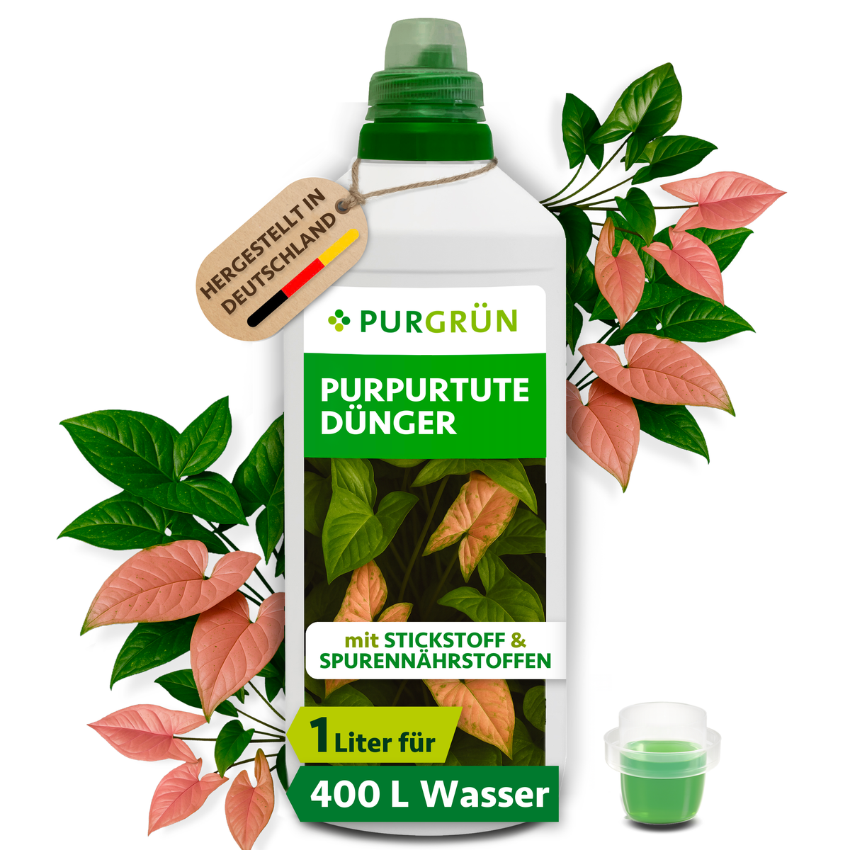 Purgrün Purpurtute-Dünger in der 1-Liter-Flasche mit Dosierkappe, umgeben von Purpurtute-Blättern und mit Anhänger „Hergestellt in Deutschland“.